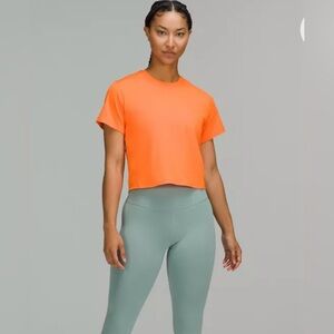 Ventilated Open-Back Train Tee. Size 4. Like New